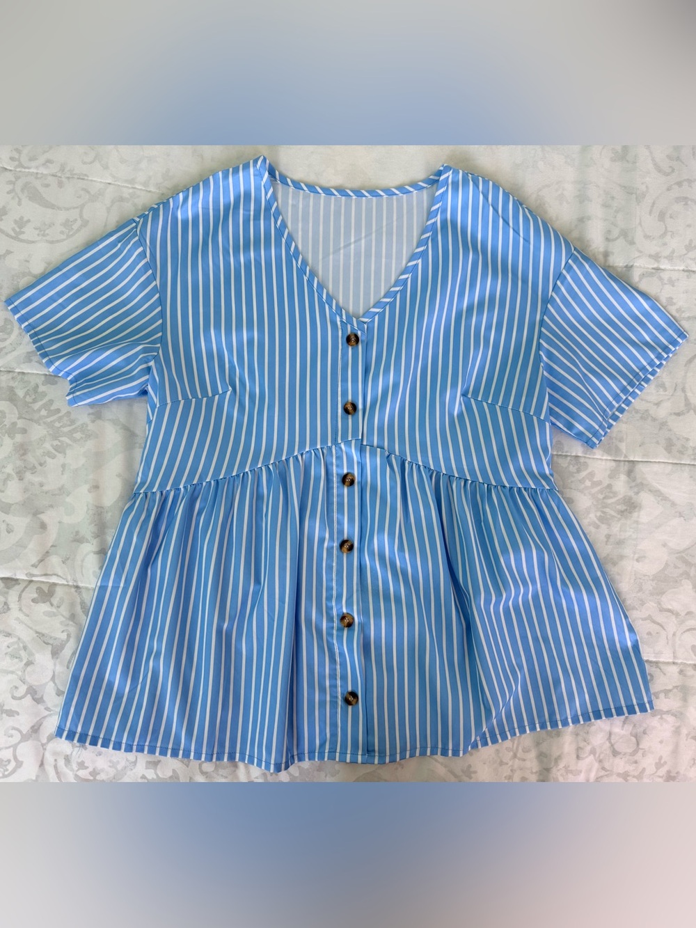 Blue and white striped blouse